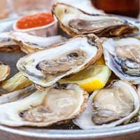 Shucked oysters and lemon